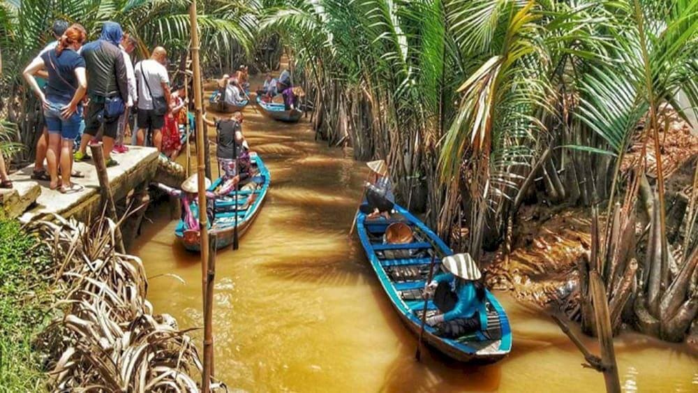 Visitors can take boat rides along the rivers and canals, surrounded by lush coconut trees